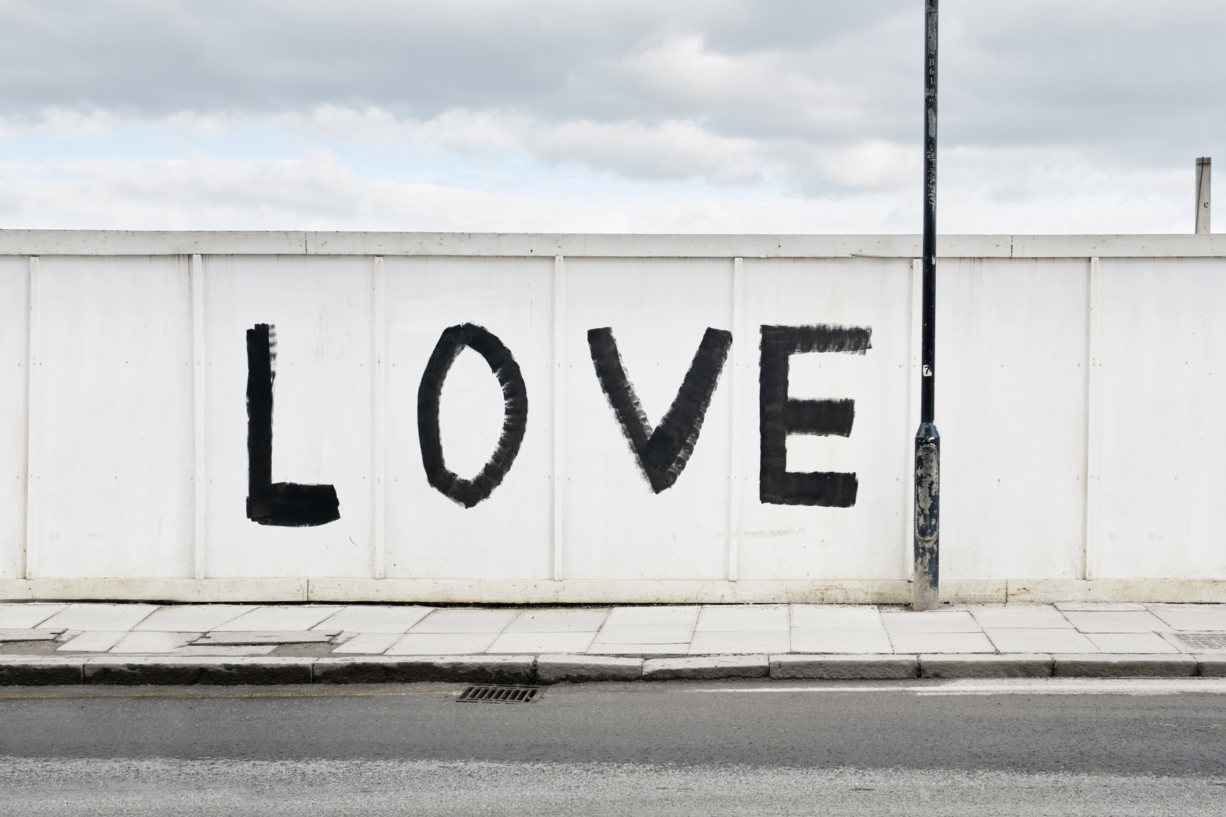 Graffiti On A Wooden Wall with the word Love painted